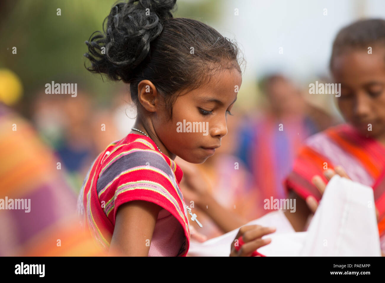 Leti Islands girl dancing in festive and cultural celebrations, Indonesia Stock Photo