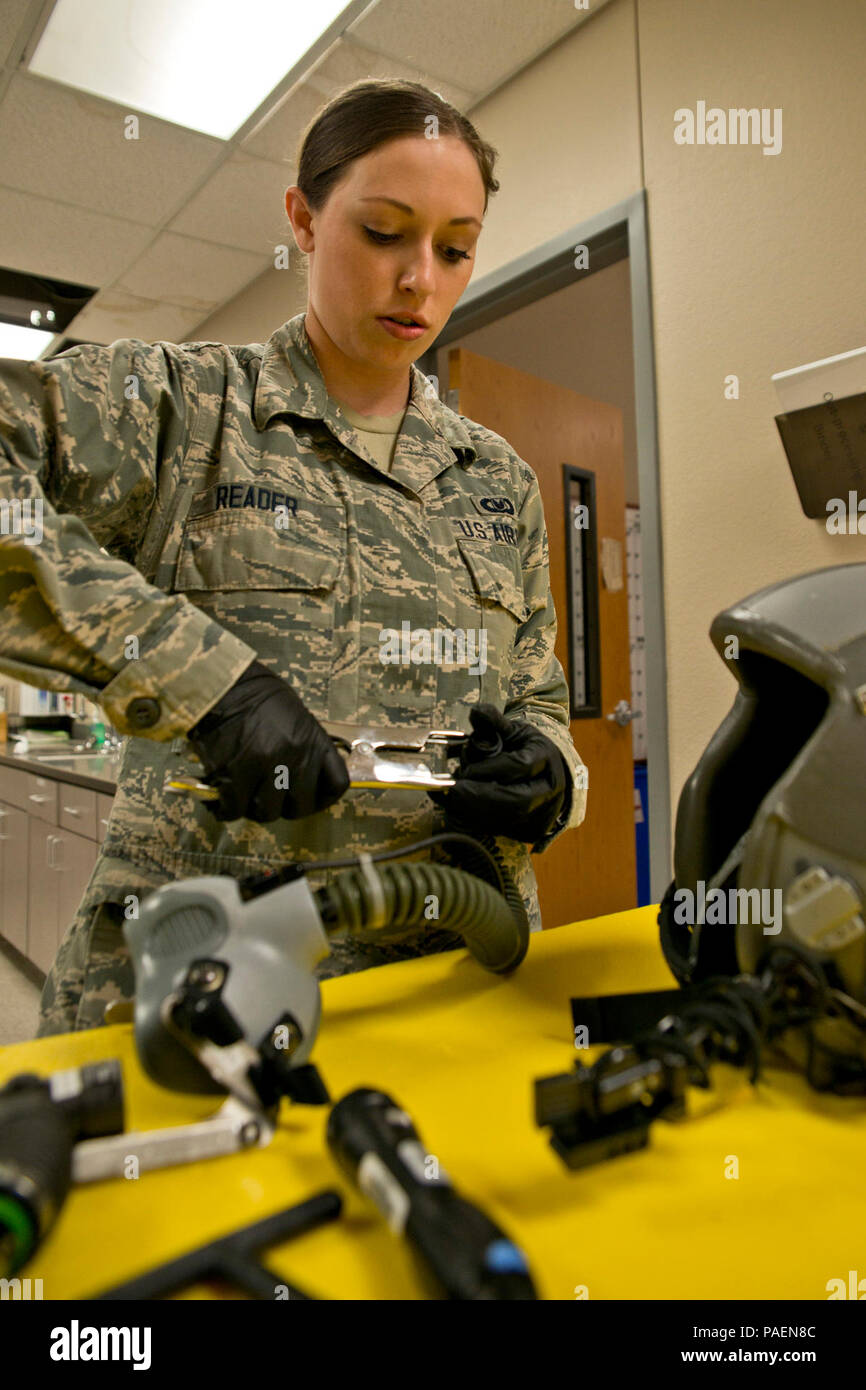 U.S. Air Force Reserve Senior Airman Bobbi Reader, an aircrew flight equipment (AFE) technician assigned to the 913th Operations Support Squadron, inspects an MBU-12/P Oxygen Mask at Little Rock Air Force Base, Ark., Mar. 13, 2016. AFE specialists are responsible for packing emergency items like parachutes and survival kits and maintaining regularly used items like flight helmets and oxygen masks. They ensure all flight and safety equipment is in perfect working order and that aircrews have the supplies necessary for any situation. (U.S. Air Force photo by Master Sgt. Jeff Walston/Released) Stock Photo