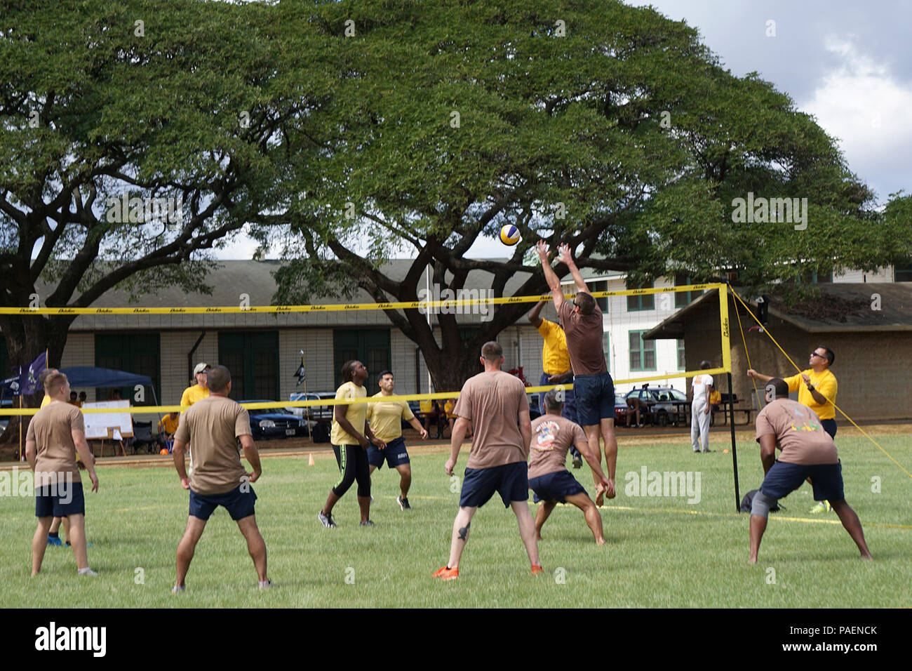 PEARL HARBOR-HICKAM, Hawaii (Feb. 19, 2016) Various competitive events between the four teams were held throughout the day which included a creative construction project, fit games (push-ups/burpees/nail drive/tire flip/sit ups/1 lap), basketball shoot-out, frisbee, volleyball, humvee push, and tug of war. Stock Photo