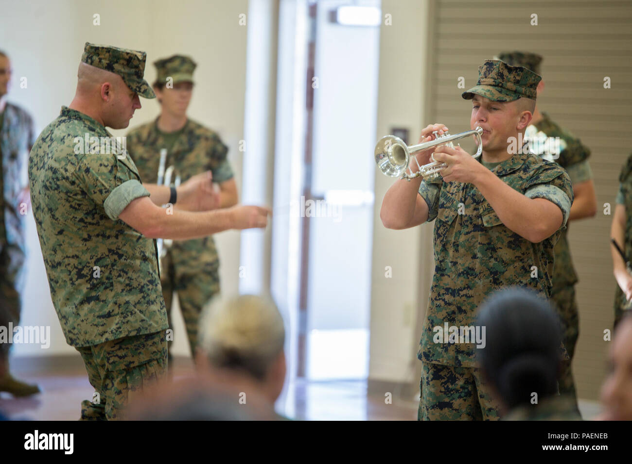 Staff Sgt. Keith Algeo (left), drum major with Marine Corps Band New