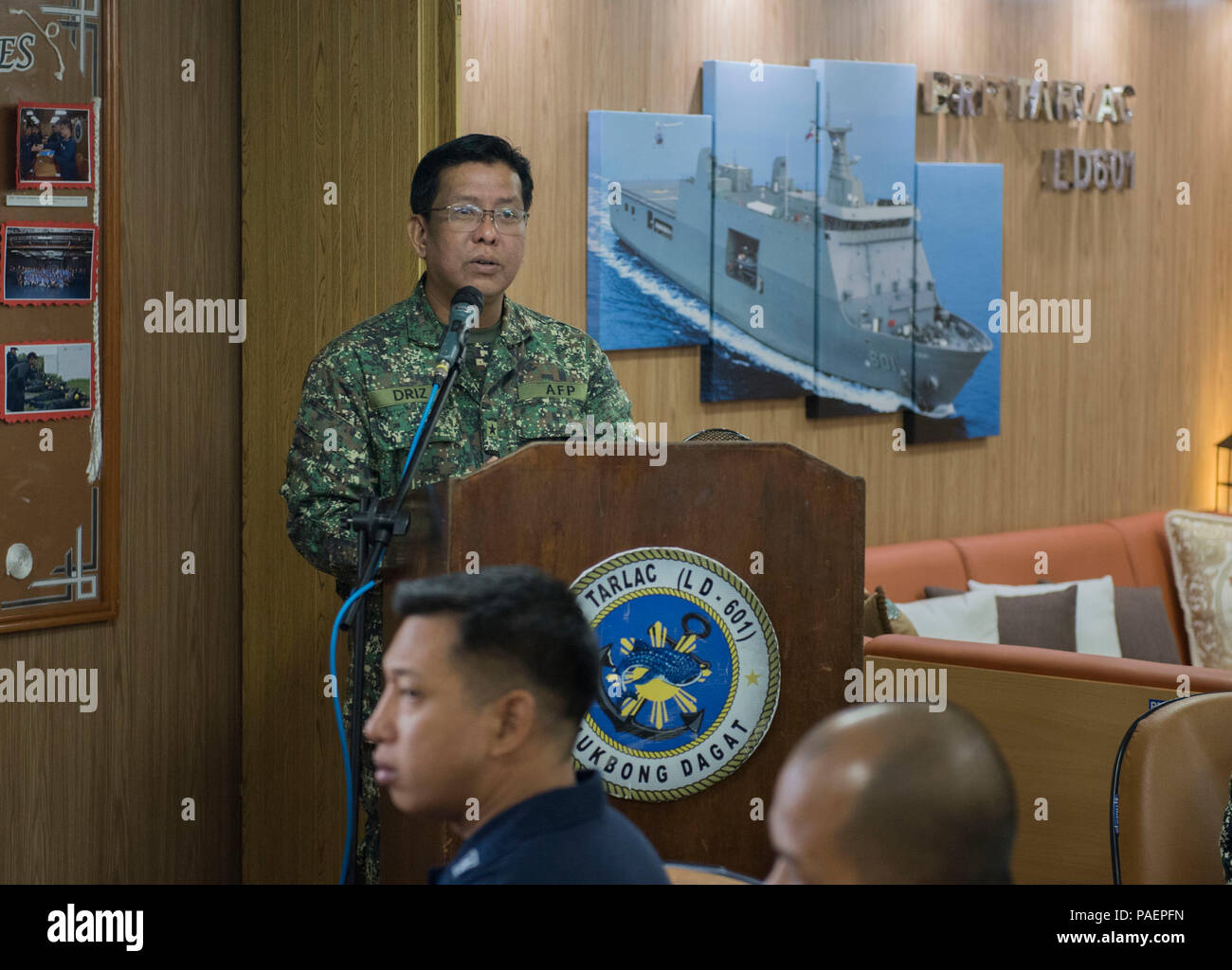 180714-N-OU129-131 SAN FERNANDO CITY, Philippines (July 14, 2018) Philippine Navy Commodore Nichols Driz, Commander, Naval Forces Northern Luzon, delivers remarks at the closing ceremony of Maritime Training Activity (MTA) Sama Sama 2018 aboard Philippine Navy ship BRP Tarlac (LD-601). The week-long engagement focuses on the full spectrum of naval capabilities and is designed to strengthen the close partnership between both navies while cooperatively ensuring maritime security, stability and prosperity. (U.S. Navy photo by Mass Communication Specialist 2nd Class Joshua Fulton/Released) Stock Photo