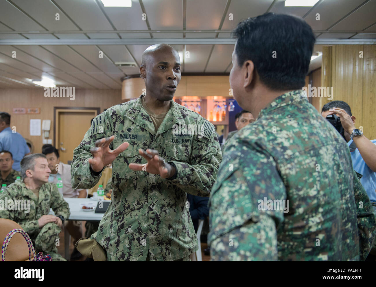 180714-N-OU129-251 SAN FERNANDO CITY, Philippines (July 14, 2018) Capt. Lex Walker, Commodore, Destroyer Squadron 7, discusses engagement activities with Philippine Navy Commodore Nichols Driz, Commander, Naval Forces Northern Luzon, at the closing ceremony of Maritime Training Activity (MTA) Sama Sama 2018 aboard Philippine Navy ship BRP Tarlac (LD-601). The week-long engagement focuses on the full spectrum of naval capabilities and is designed to strengthen the close partnership between both navies while cooperatively ensuring maritime security, stability and prosperity. (U.S. Navy photo by  Stock Photo