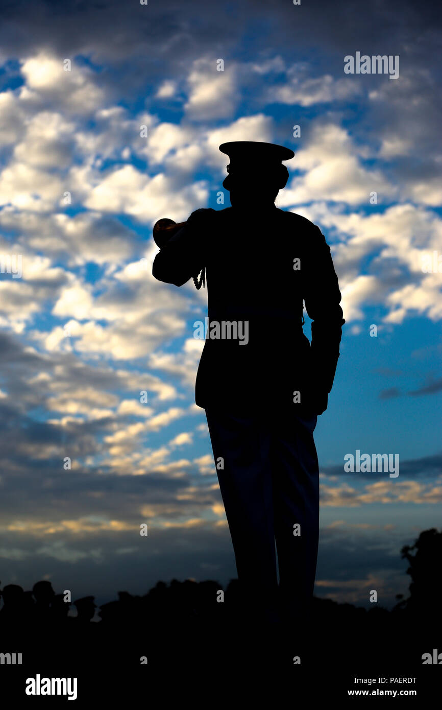 Staff Sgt. Codie Williams, ceremonial bugler, “The Commandant's Own,” U.S.  Marine Drum & Bugle Corps, plays Taps during a Tuesday Sunset Parade at the  Lincoln Memorial, Washington D.C., July 17, 2018. The