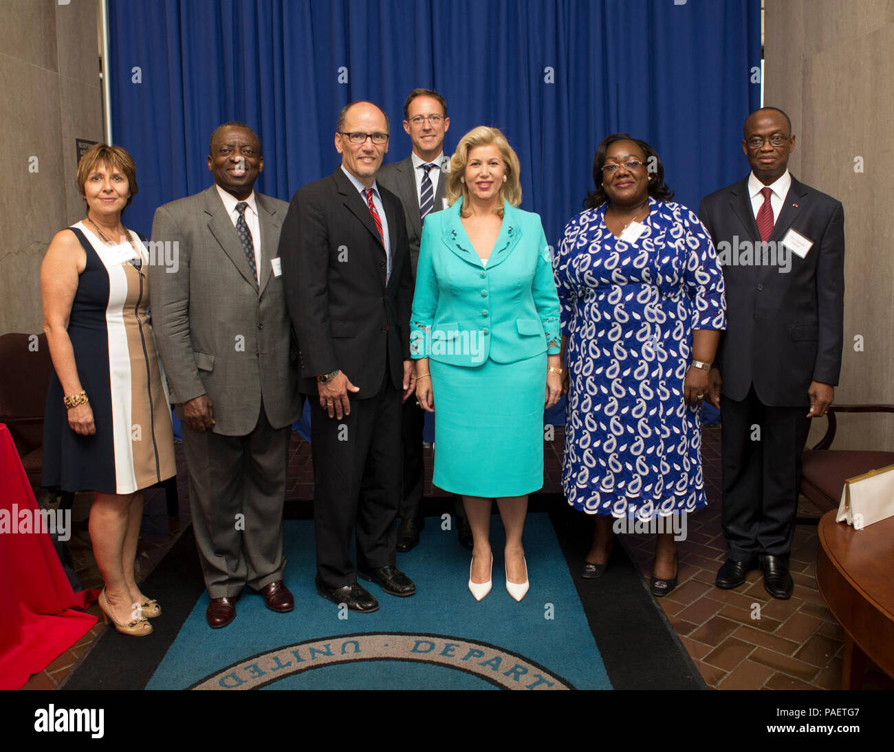 24 June 2015 Р Washington, DC Р U.S. Secretary of Labor Thomas Perez delivers remarks at the ILAB Cocoa Meetings.  Prior to the start of the meeting Secretary Perez meets with Madame Dominique Ouattara, First Lady of the Republic of Cote D'Ivoire. Pictured from Left to Right: Susan Snyder Smith, Ebenezer Adjirackov, Minister of Trade for the Embassy of Ghana, Secretary Thomas Perez, Bill Guyton, President and CEO of the World Cocoa Foundation, Madame Dominique Ouattara, First Lady of the Republic of Cote D'Ivoire, Anne Desiree Ouloto, Minister of Solidarity, Family, Women, and Children of Cote Stock Photo