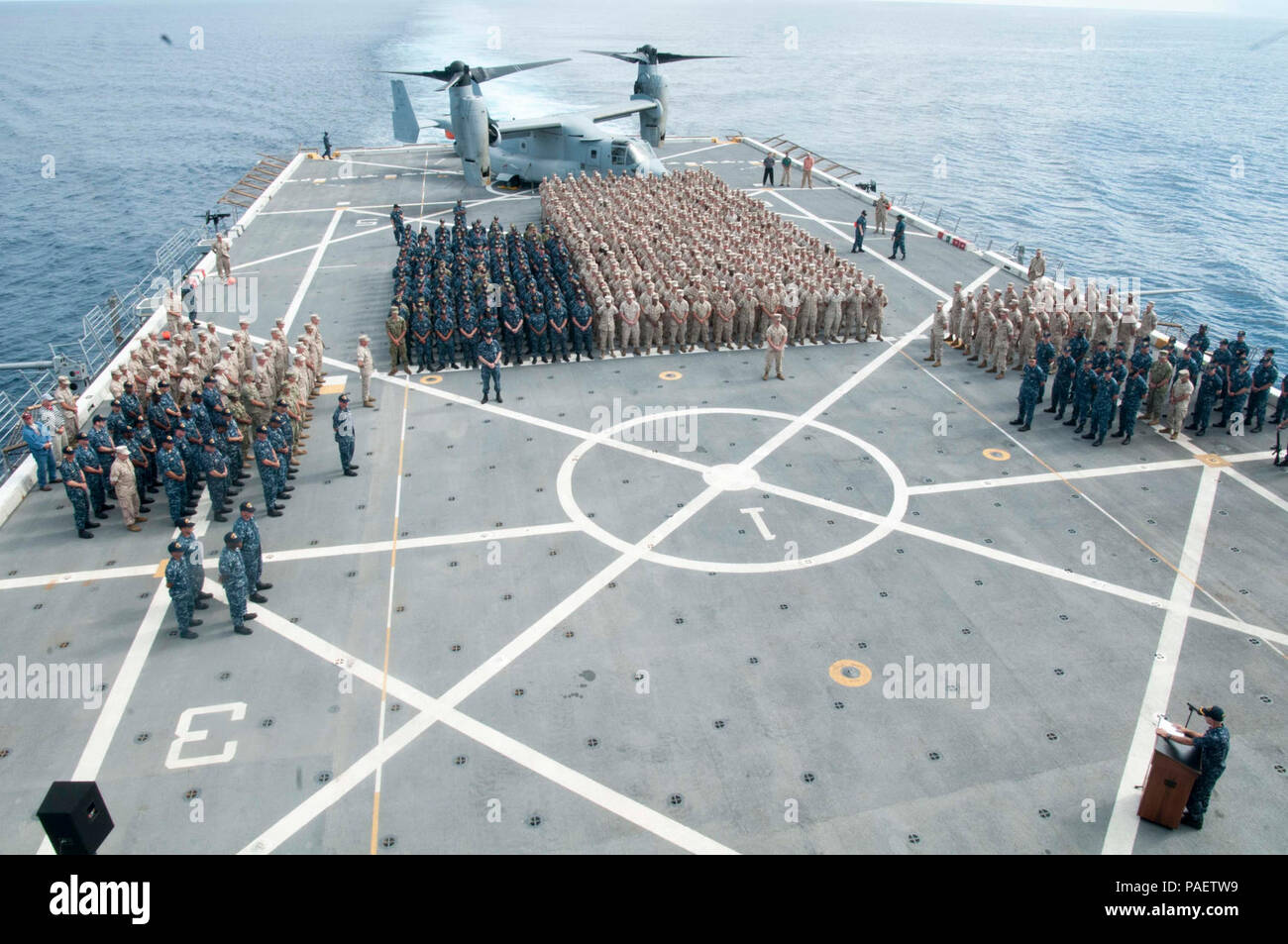 Sailors and Marines remember Sept. 11, 2001, during a memorial service aboard the amphibious transport dock ship USS New York (LPD 21). Stock Photo