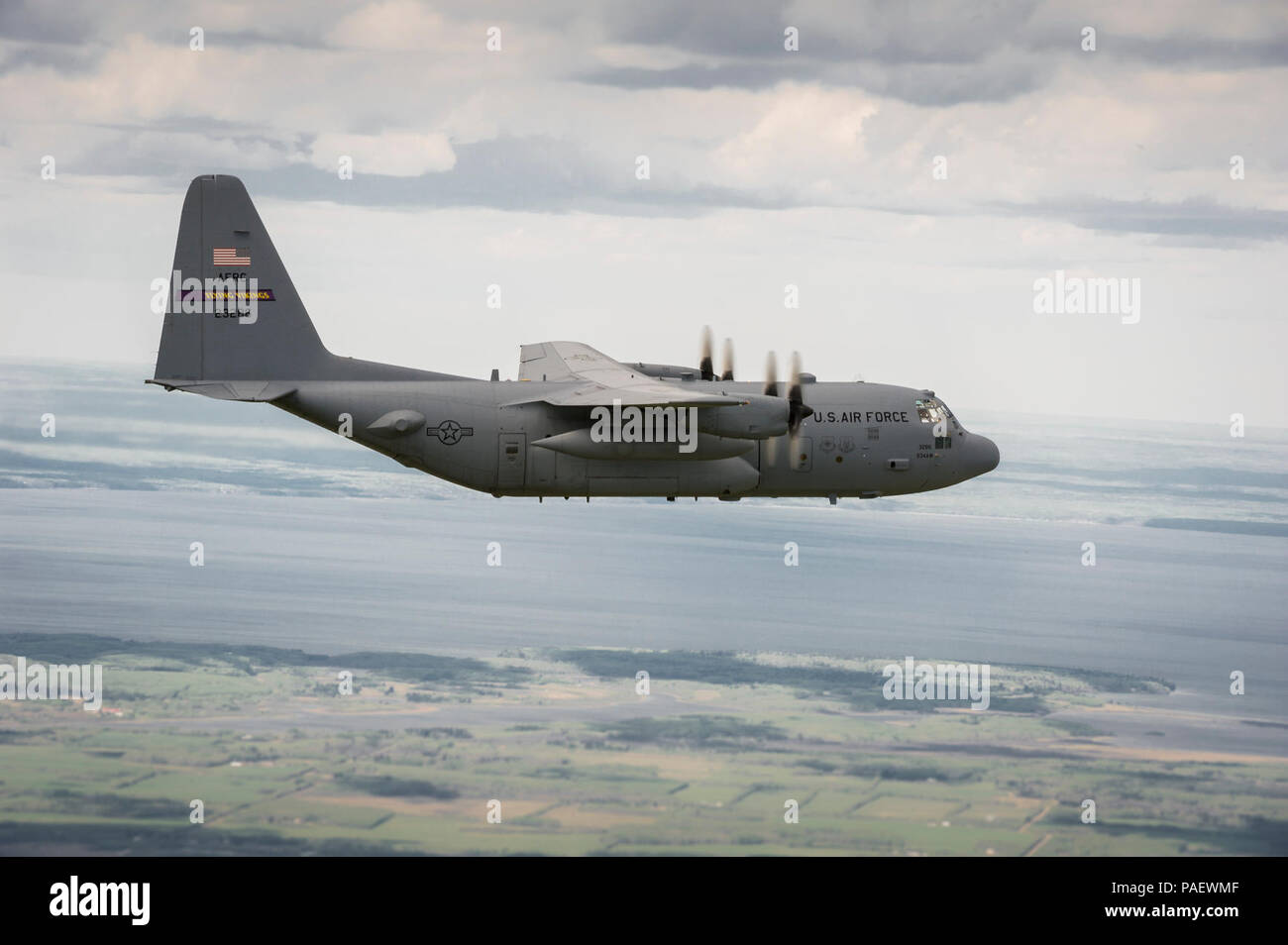 A U.S. Air Force C-130 Hercules aircraft with the 934th Airlift Wing, Minneapolis-St Paul Air Reserve Station, Minn., flies a simulated combat sortie during Maple Flag 47 in Edmonton/Cold Lake, Alberta, Canada, May 30, 2014. Maple Flag is an international exercise designed to enhance the interoperability of C-130 aircrews, maintainers and support specialists in a simulated combat environment. Stock Photo