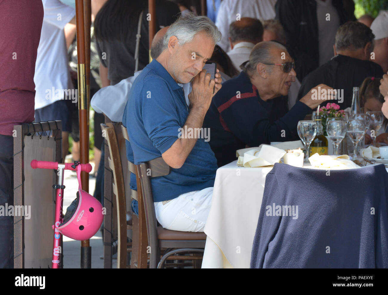 Andrea Bocelli receives a gift while eating lunch in Beverly Hills 