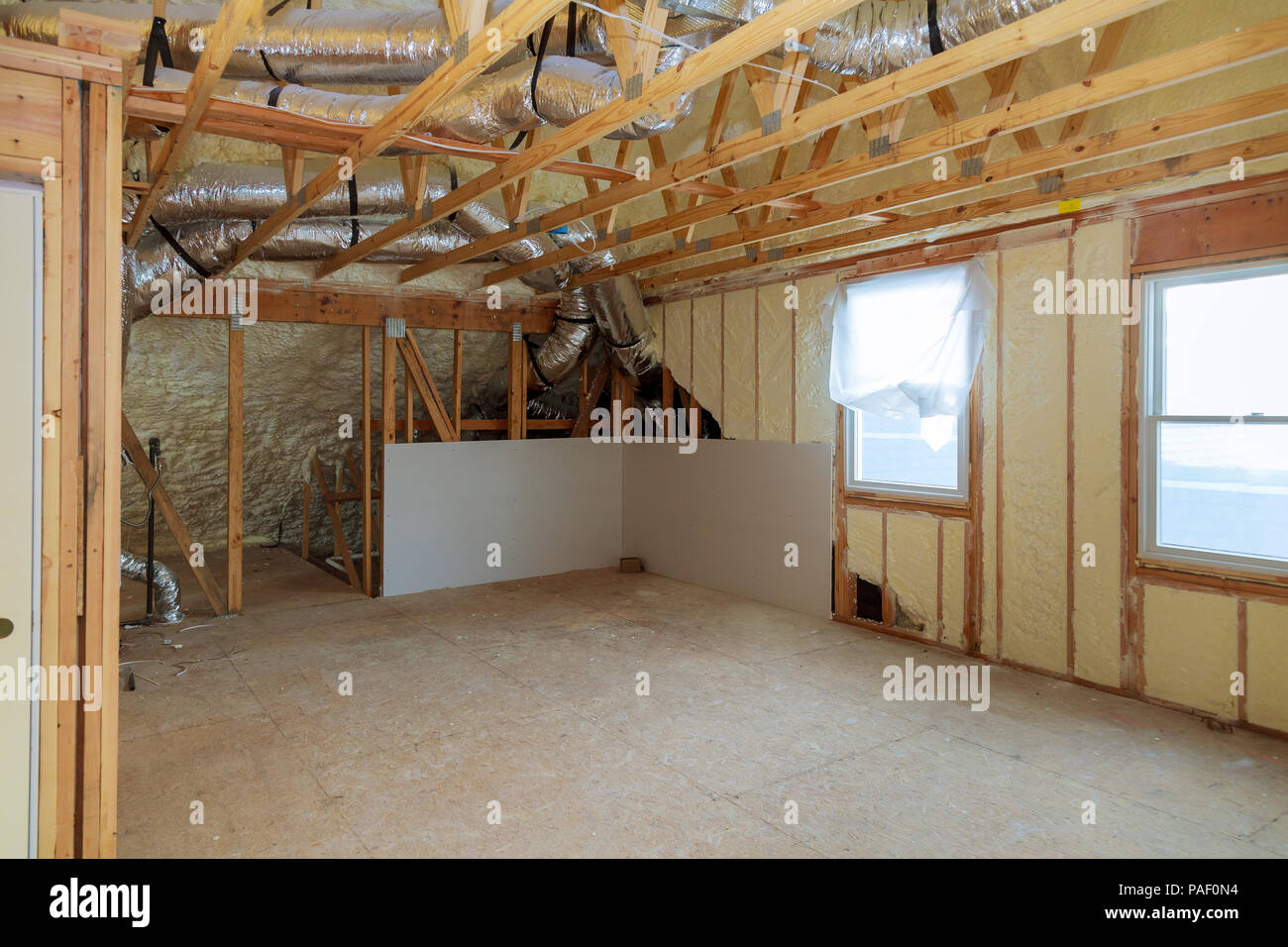 Work Site Of Installing Thermal Foam Insulation Under The Roof