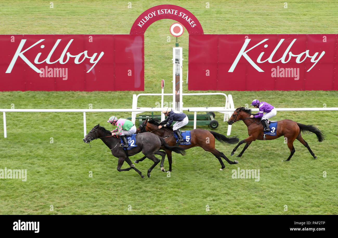 Silver Service ridden by Gary Caroll (left) wins The Victoria Racing Club Trophy Nursery Handicap during day two of the Darley Irish Oaks Weekend at Curragh Racecourse, County Kildare. Stock Photo