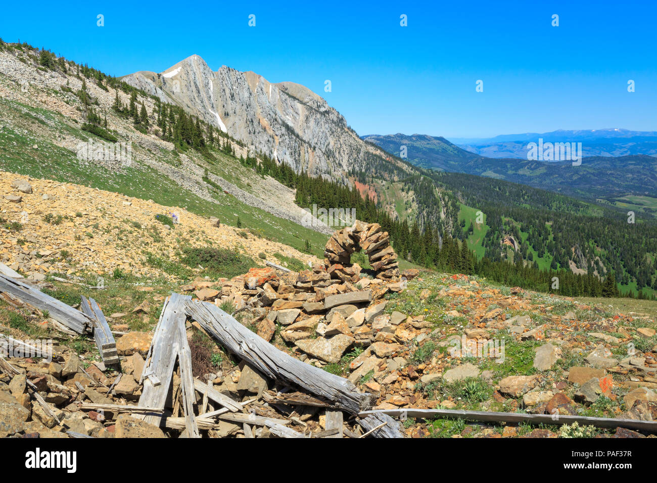 old shafthouse mine remnants and stone marker in the bridger mountains near bozeman, montana Stock Photo