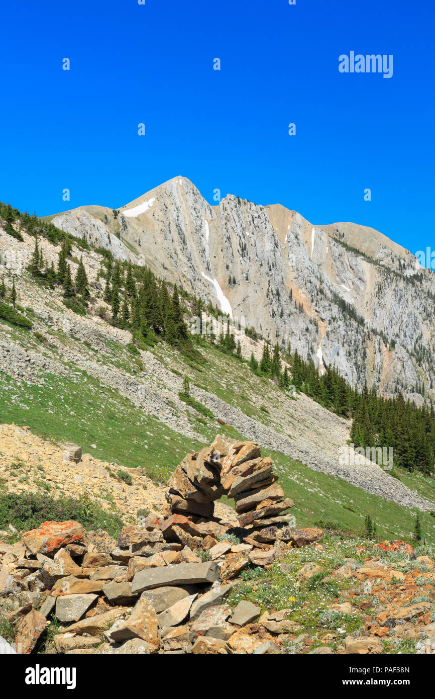 old shafthouse mine remnants and stone marker in the bridger mountains near bozeman, montana Stock Photo