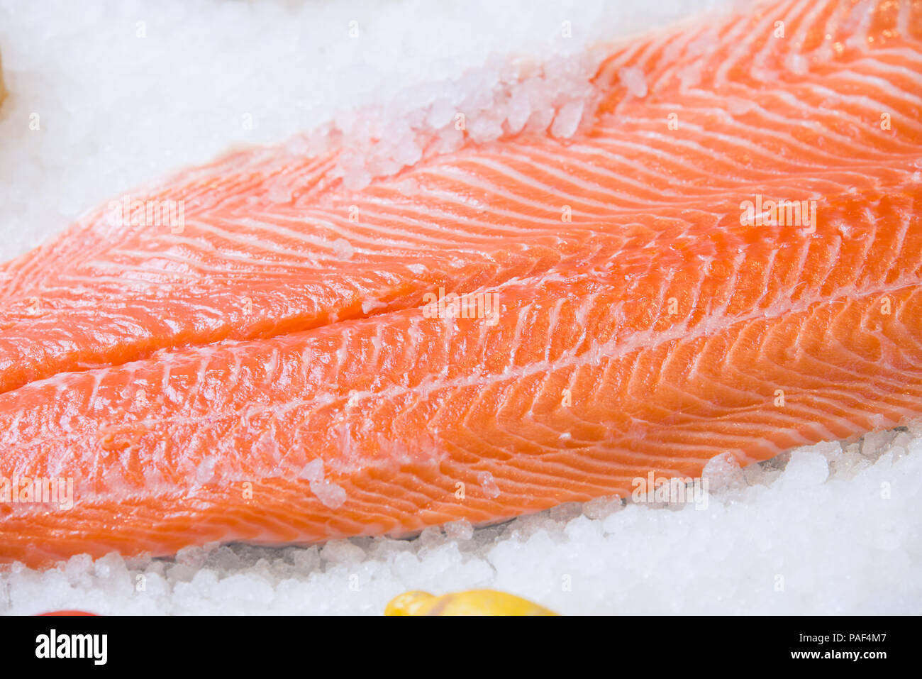 Fresh salmon fillet on ice Stock Photo - Alamy