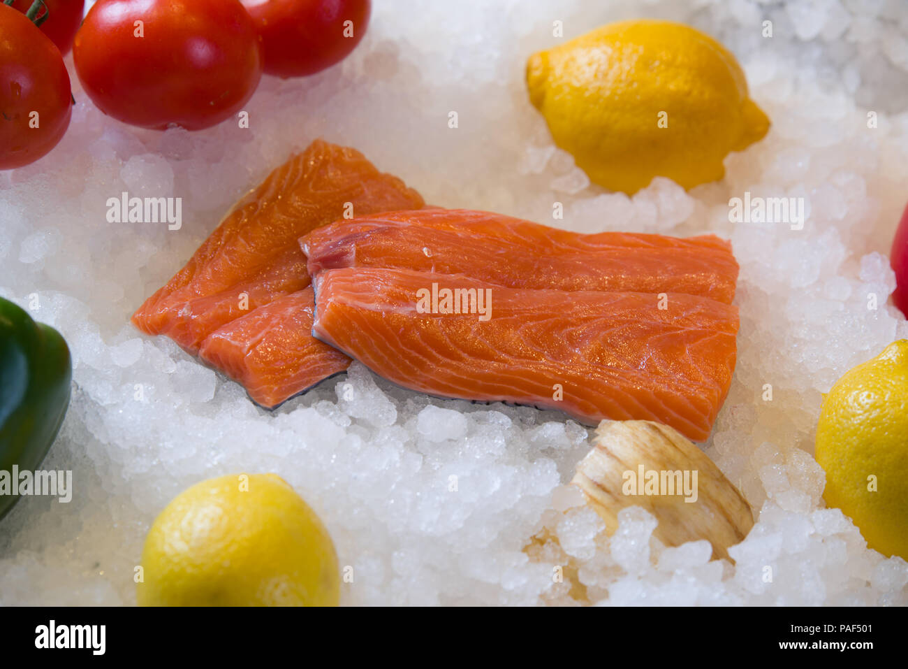 Fresh salmon fillet on ice Stock Photo - Alamy