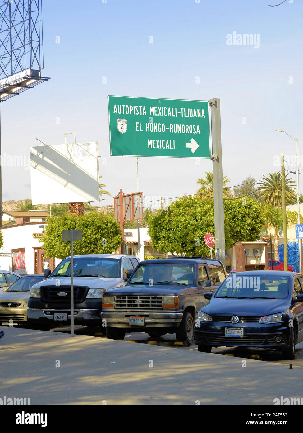 Sign for the Tijuana-Mexicali highway from Tecate towards Mexicali and La Rumorosa from Parque Miguel Hidalgo in downtown Tecate, Baja Calif., Mexico. Stock Photo
