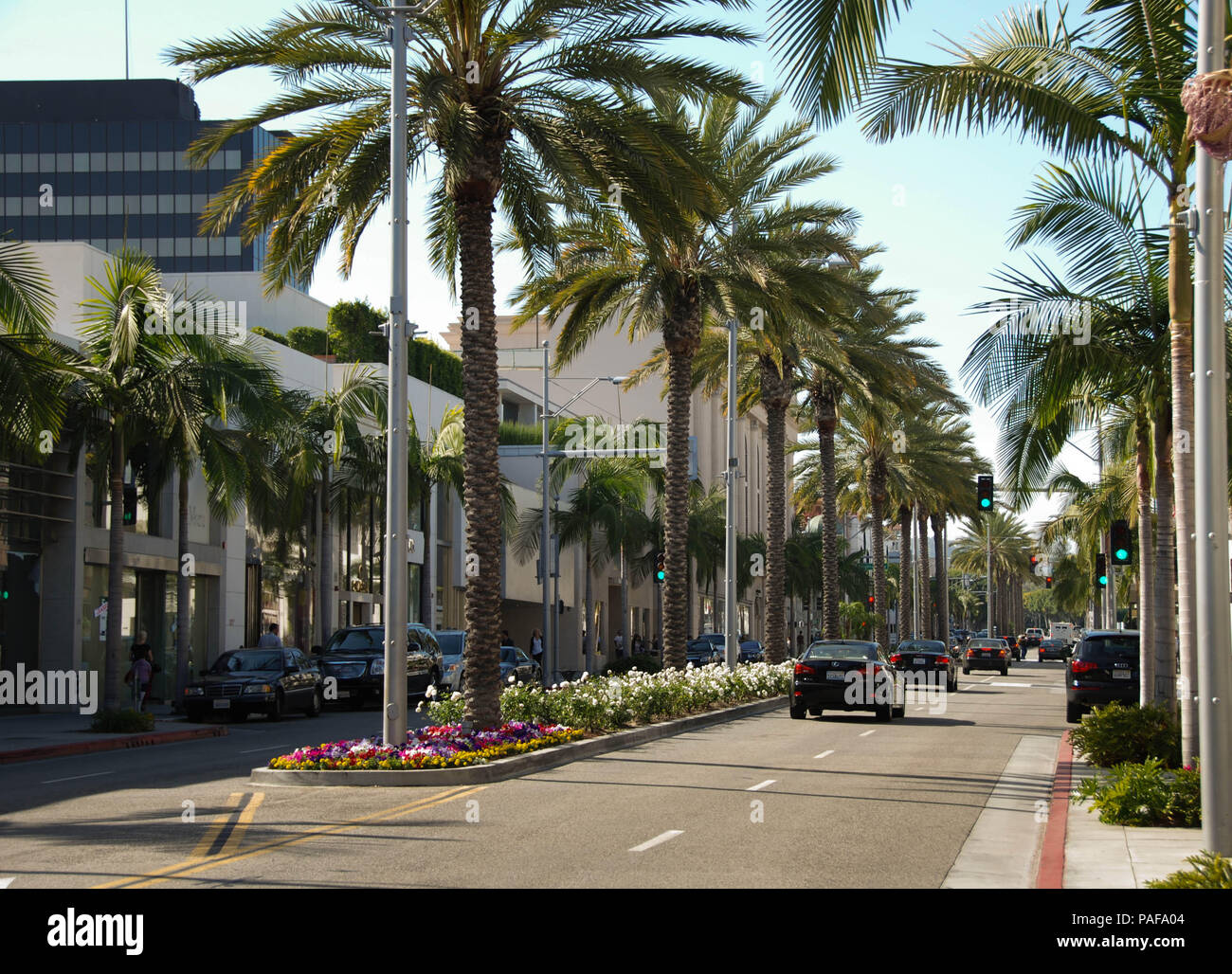 Wide angle view of designer shops and palm trees on Rodeo Drive, Beverly Hills, Los Angeles Stock Photo