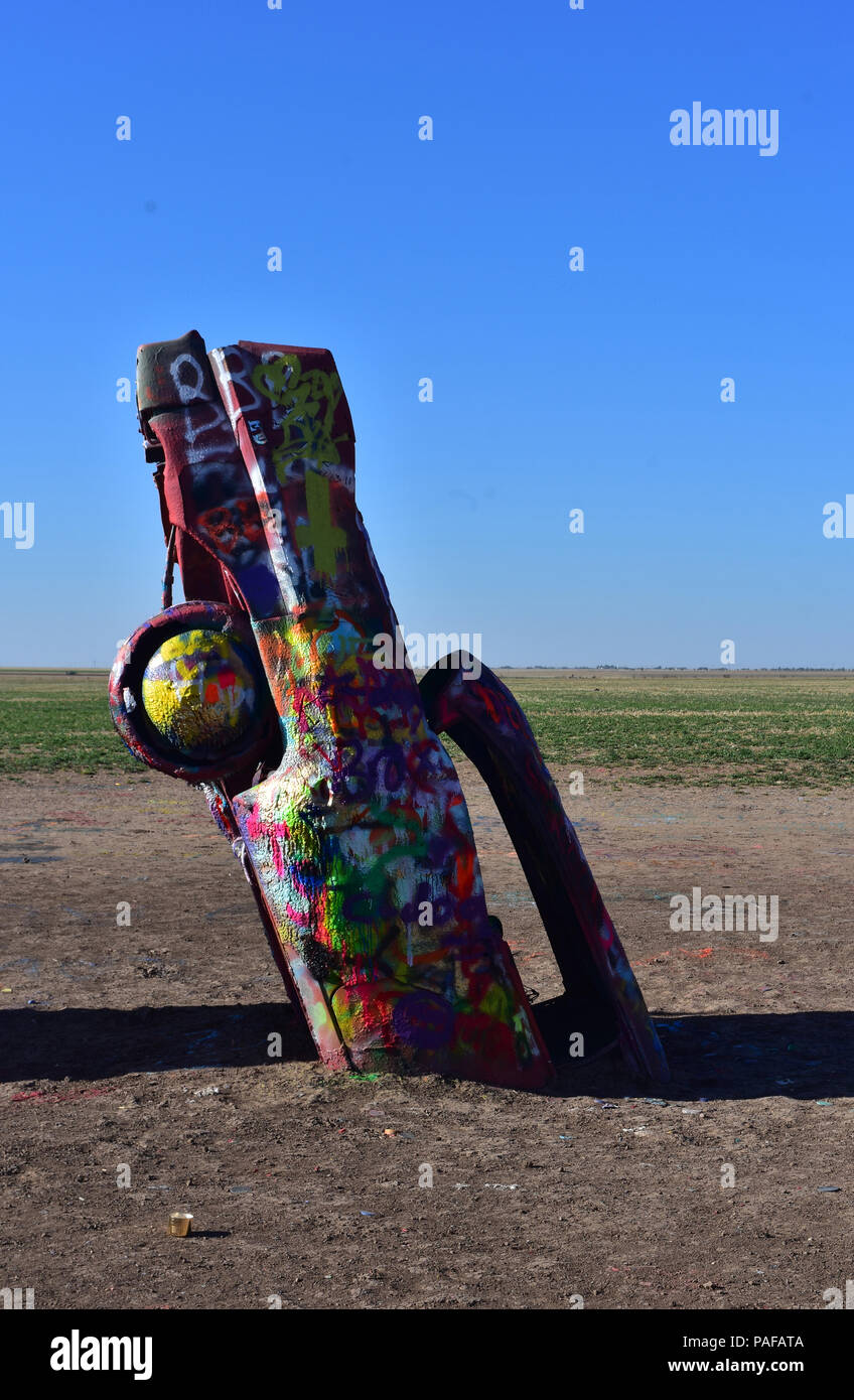 Brightly spray painted cadillac at Cadillac Ranch Stock Photo Alamy