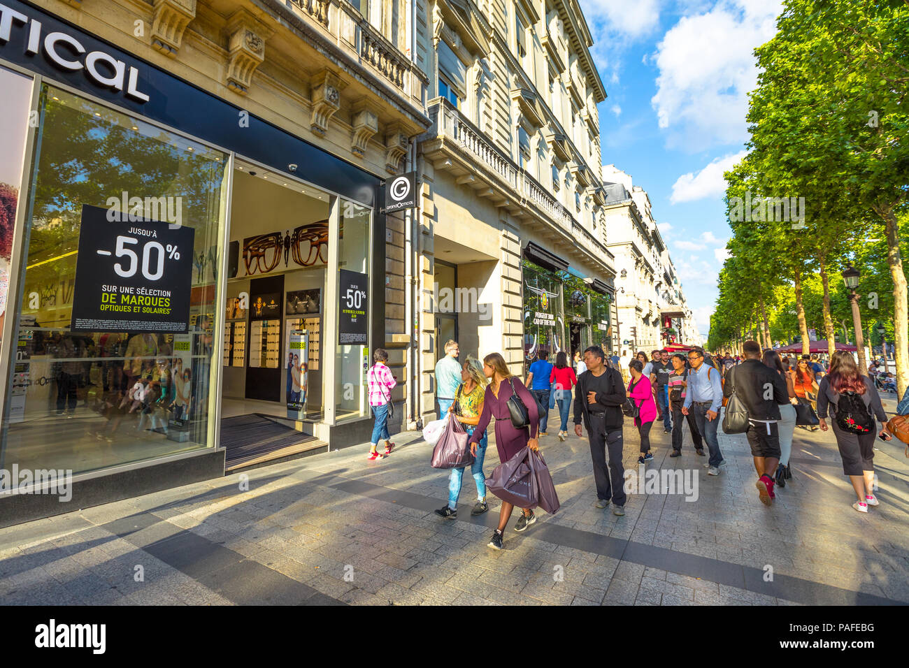 Paris, France - July 2, 2017: tourists walk on the most famous