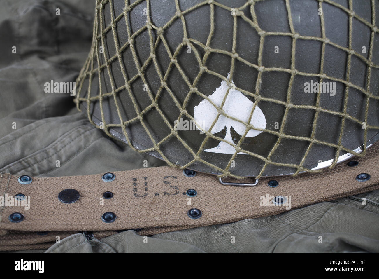 ww2 us army helmet with ace of spades emblem on green uniform Stock ...