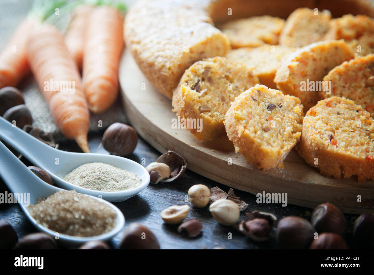 Vegan carrot cake detail with brown sugar and ginger nuts. Stock Photo