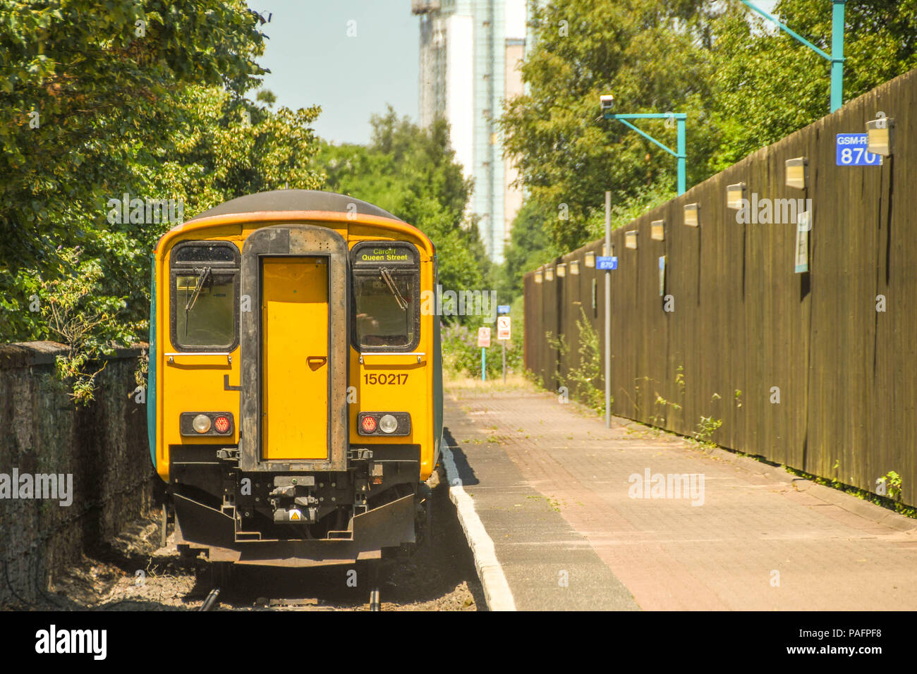 Commuter train departing the single platform railway station in Cardiff Bay Stock Photo Alamy