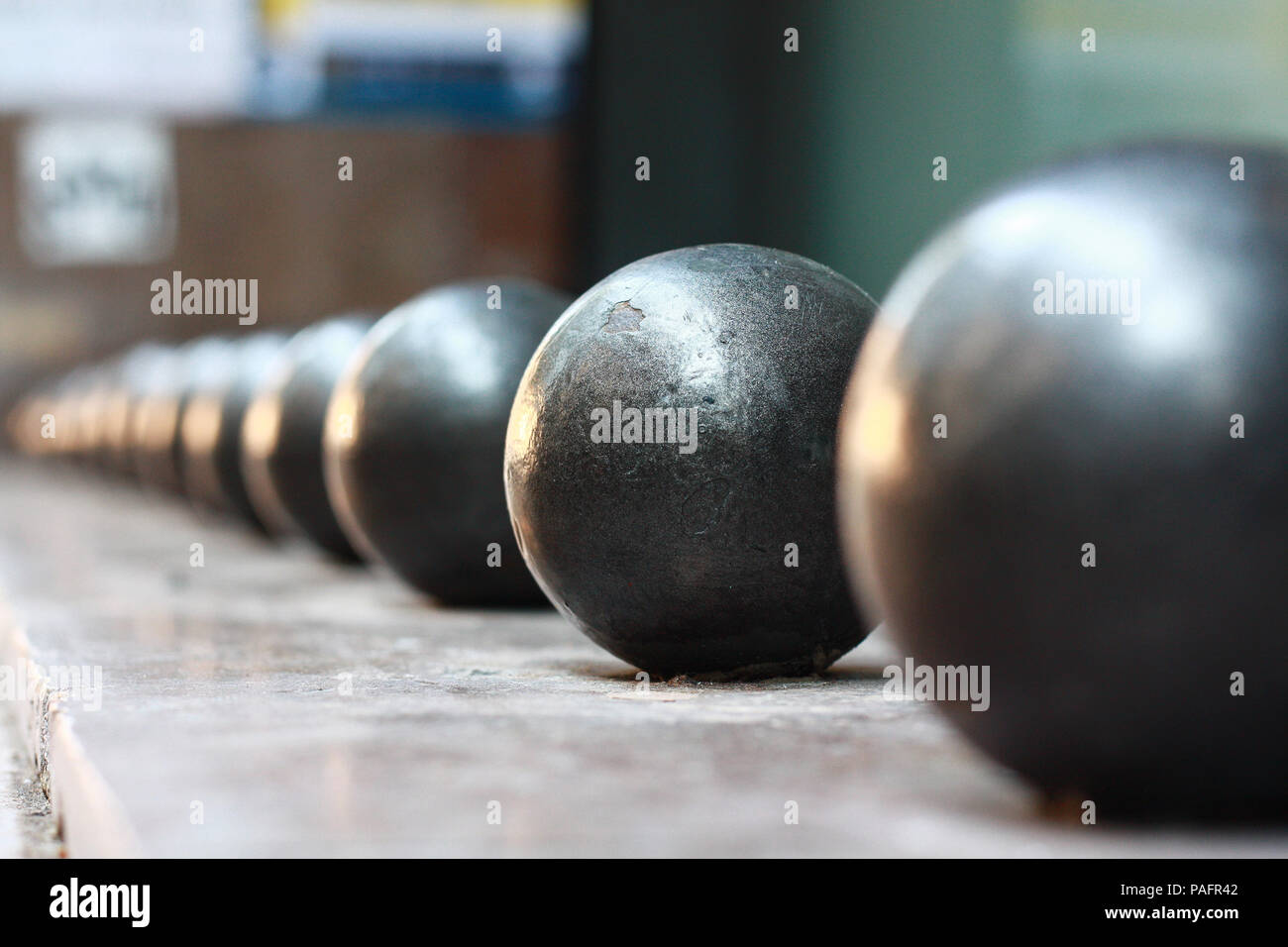 Steel balls in a line illustrating the concept of a chain of cause and