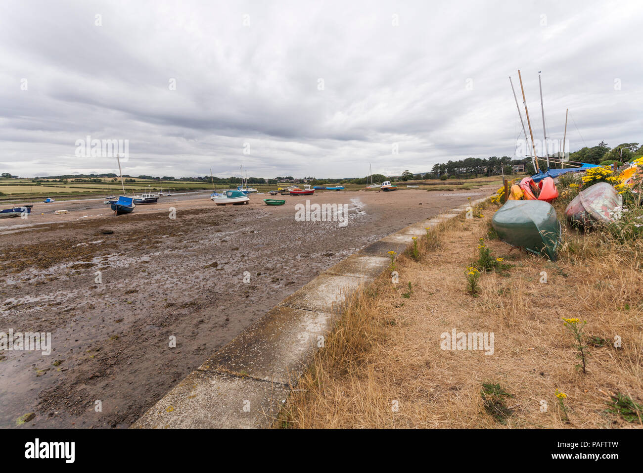 Boats moored in Alnmouth harbour,Northumberland,England,UK at low tide ...