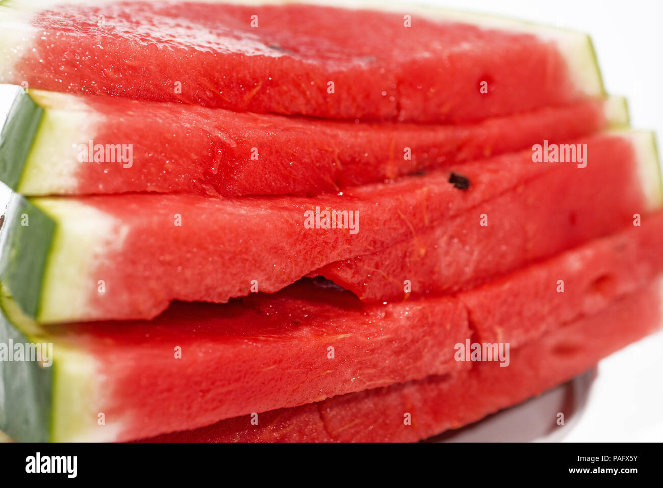 Isolated slices of Watermelon. The biggest berry Stock Photo Alamy