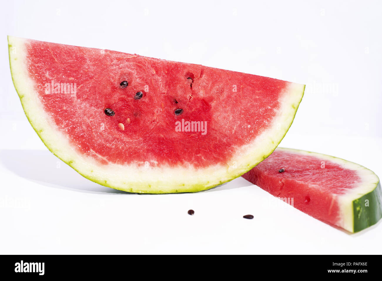 Isolated slices of Watermelon. The biggest berry Stock Photo Alamy