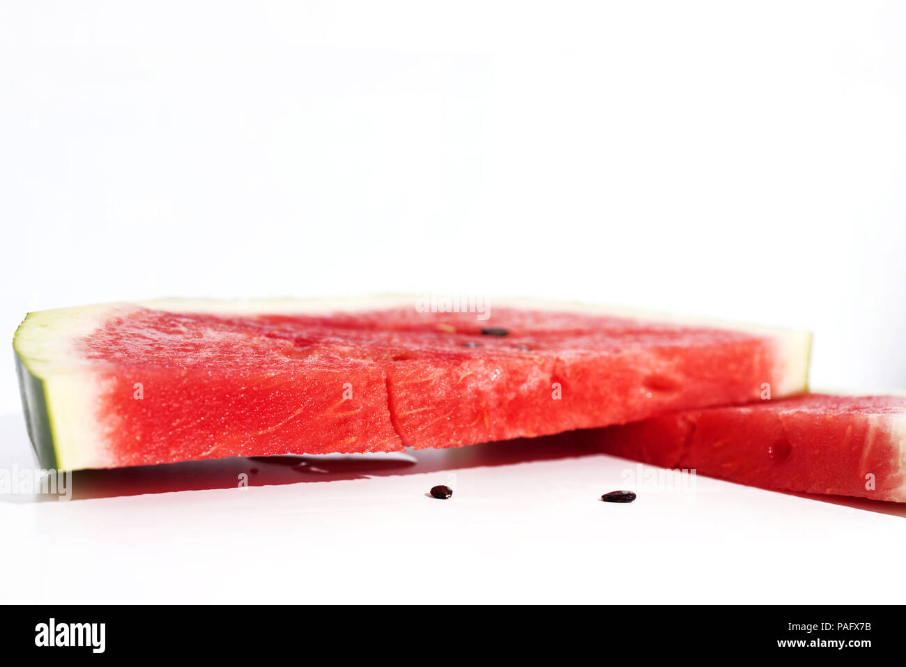 Isolated slices of Watermelon. The biggest berry Stock Photo Alamy