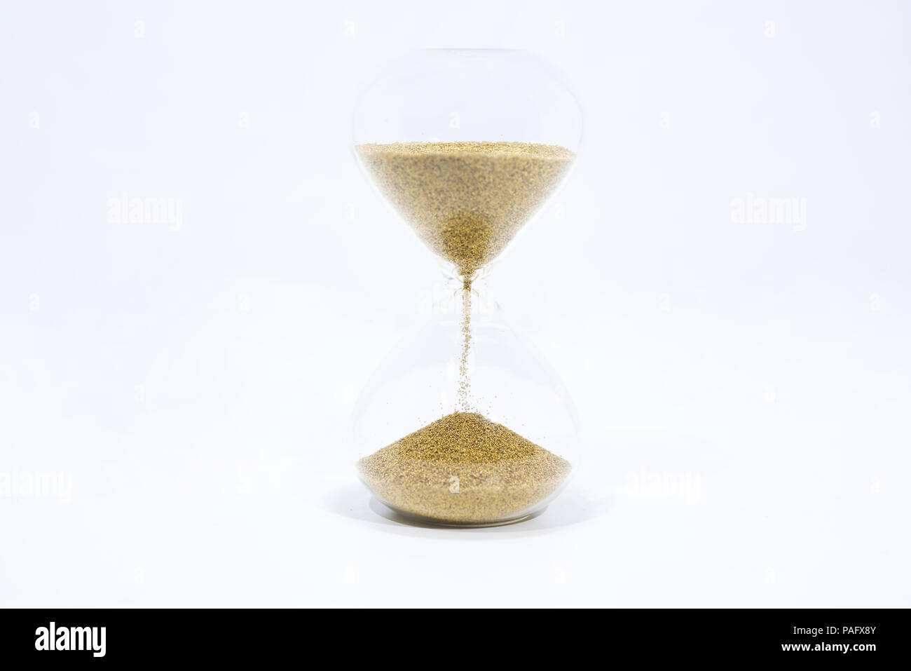 Time abstraction. Hourglass isolated on white background Stock Photo ...