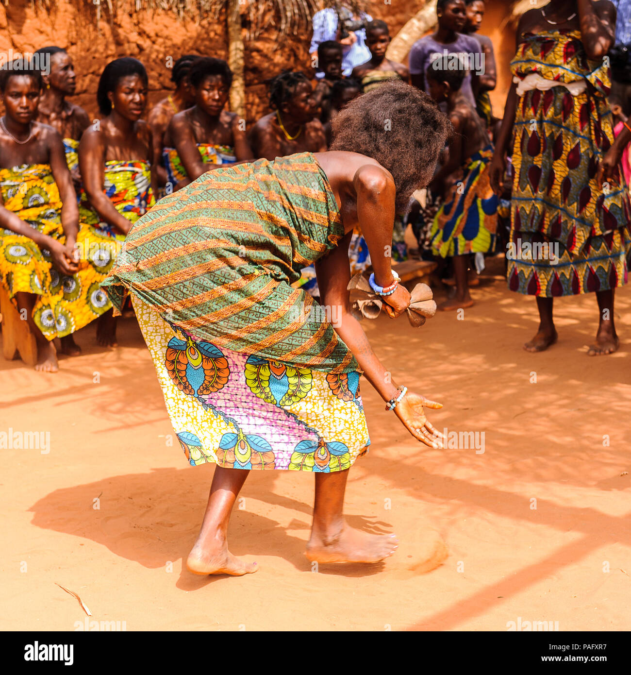 KARA, TOGO - MAR 11, 2012: Unidentified Togolese woman in a traditional  dress dances the religious voodoo dance. Voodoo is the West African religion  Stock Photo - Alamy