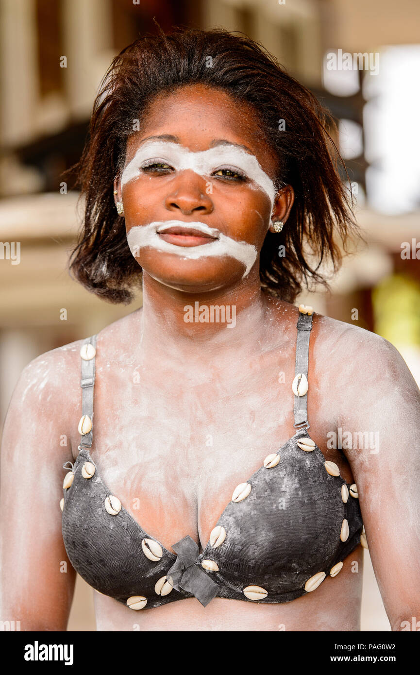 GABON - MARCH 6, 2013: Portrait of an unidentified Gabonese girl with the white paint drawings on her face in Gabon, Mar 6, 2013. White paint symboliz Stock Photo