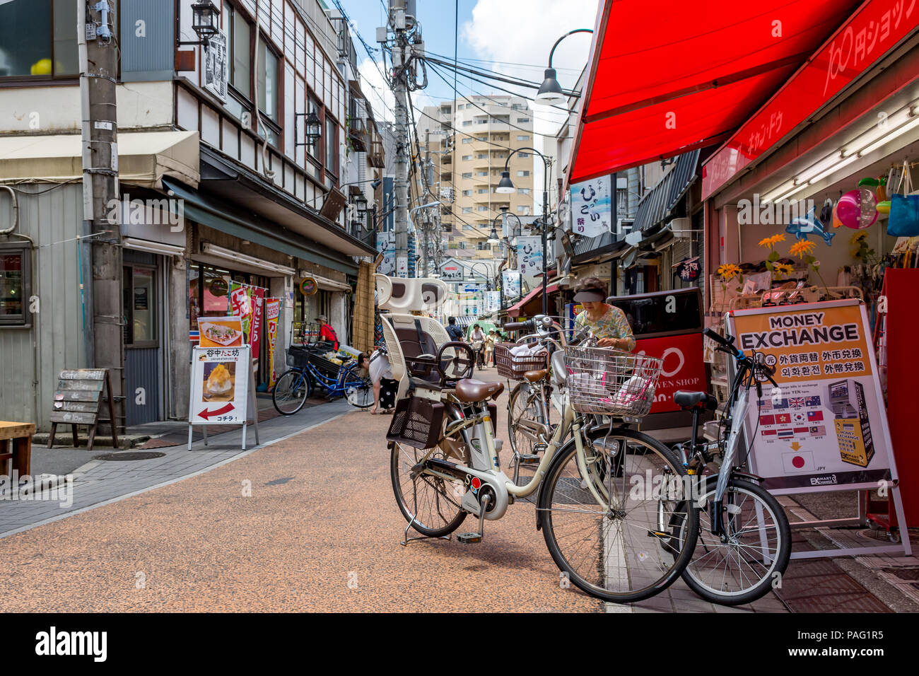 Bicycles Parked Outside A Convenience Store On A Tokyo Street Stock Photo Alamy