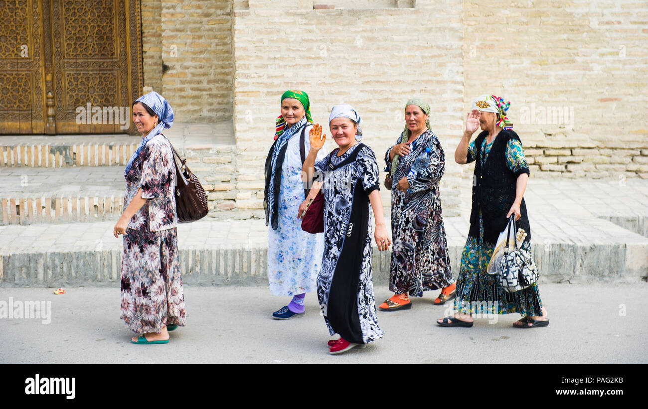 BUKHARA, UZBEKISTAN - JUNE 6, 2011: Unidentified Uzbek women came to see Samarquand in Uzbekistan, Jun 6, 2011.  81% of people in Uzbekistan belong to Stock Photo