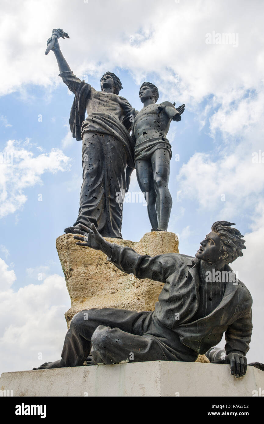 Monument commemorating the martyrs executed by the Ottomans riddled with bullet holes from the Lebanese civil war, Martyrs' square, Beirut, Lebanon Stock Photo