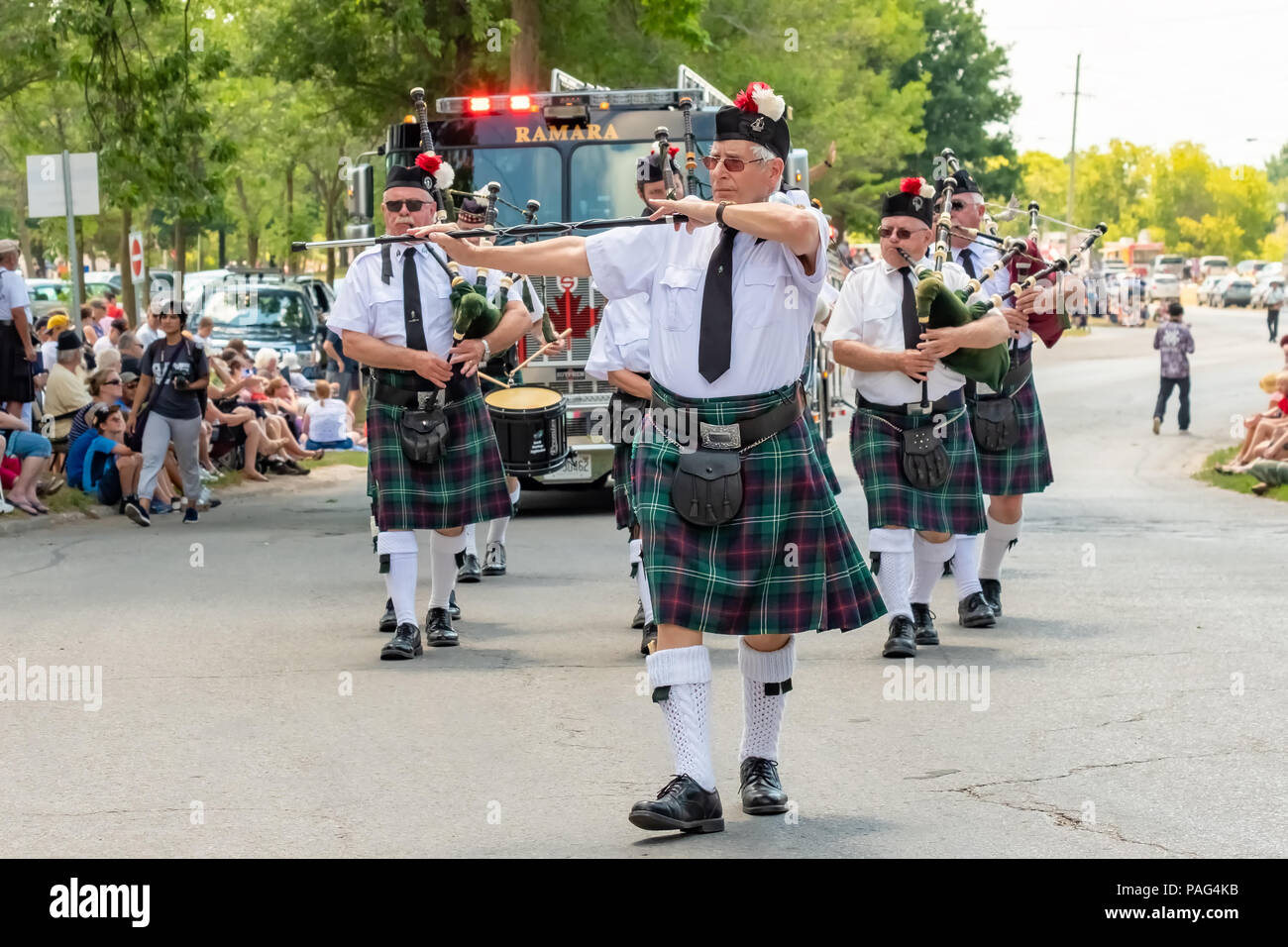 Members of the Highland Creek Branch of the Royal Canadian Legion march in the 41st Annual Scottish Festival in Orillia Ontario. Stock Photo