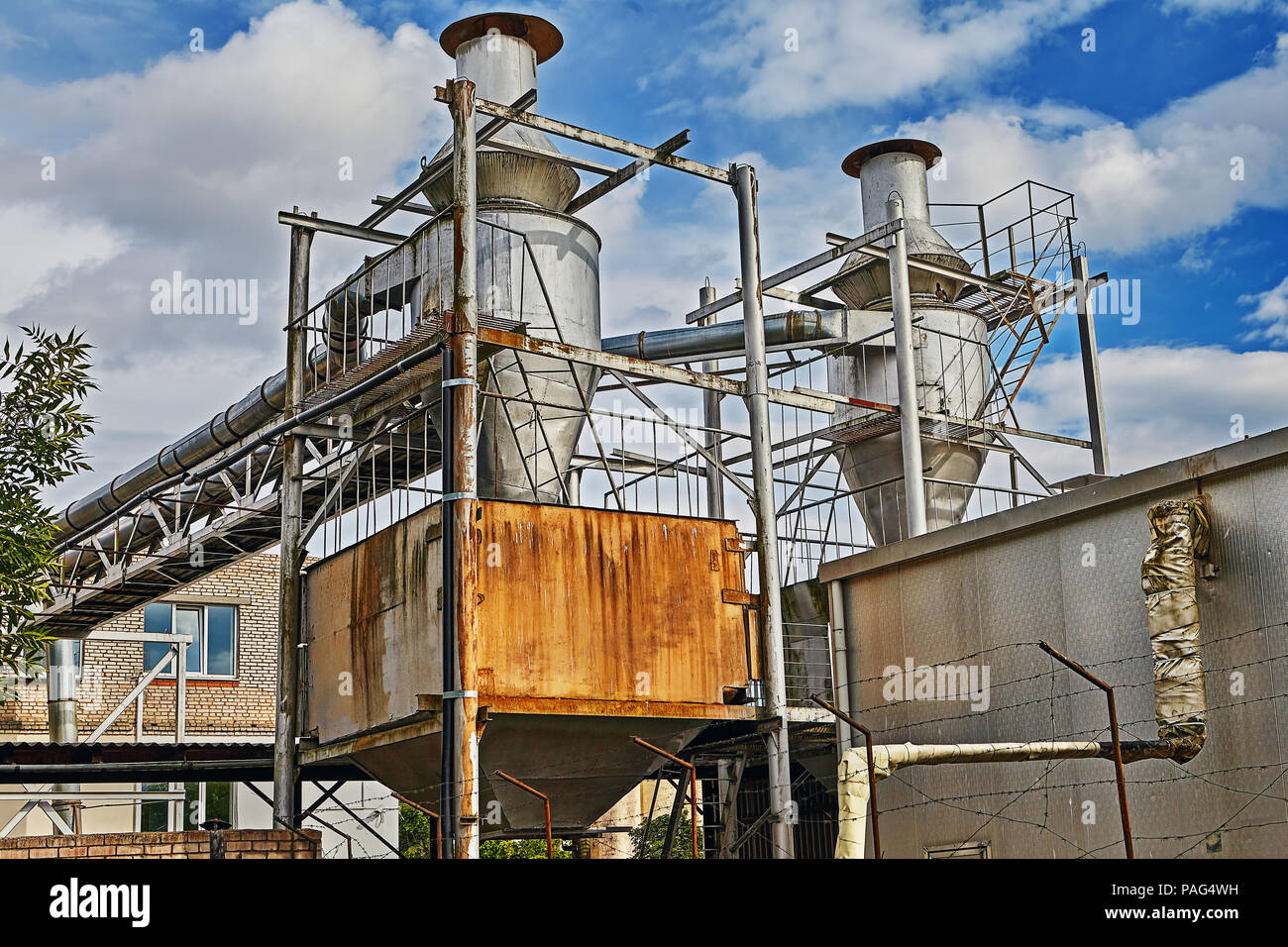Vitebsk, Belarus - July 7, 2018: Grain silo on  large-scale bakery cabled for unloading. Stock Photo