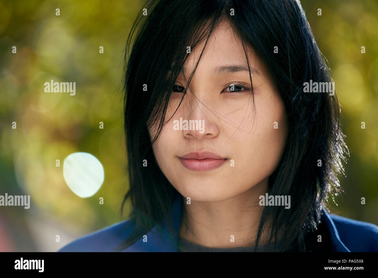 Young serious woman close hi-res stock photography and images - Alamy