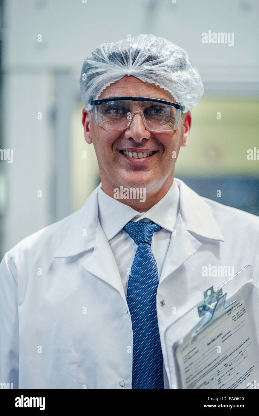 Male scientist standing and smiling hi-res stock photography and images ...