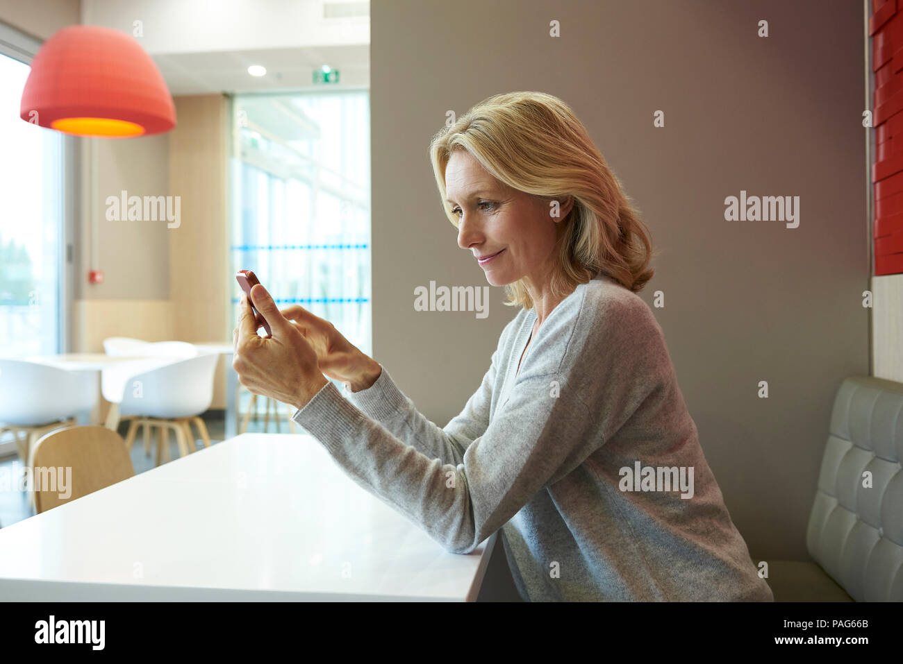 Woman using smart phone Stock Photo