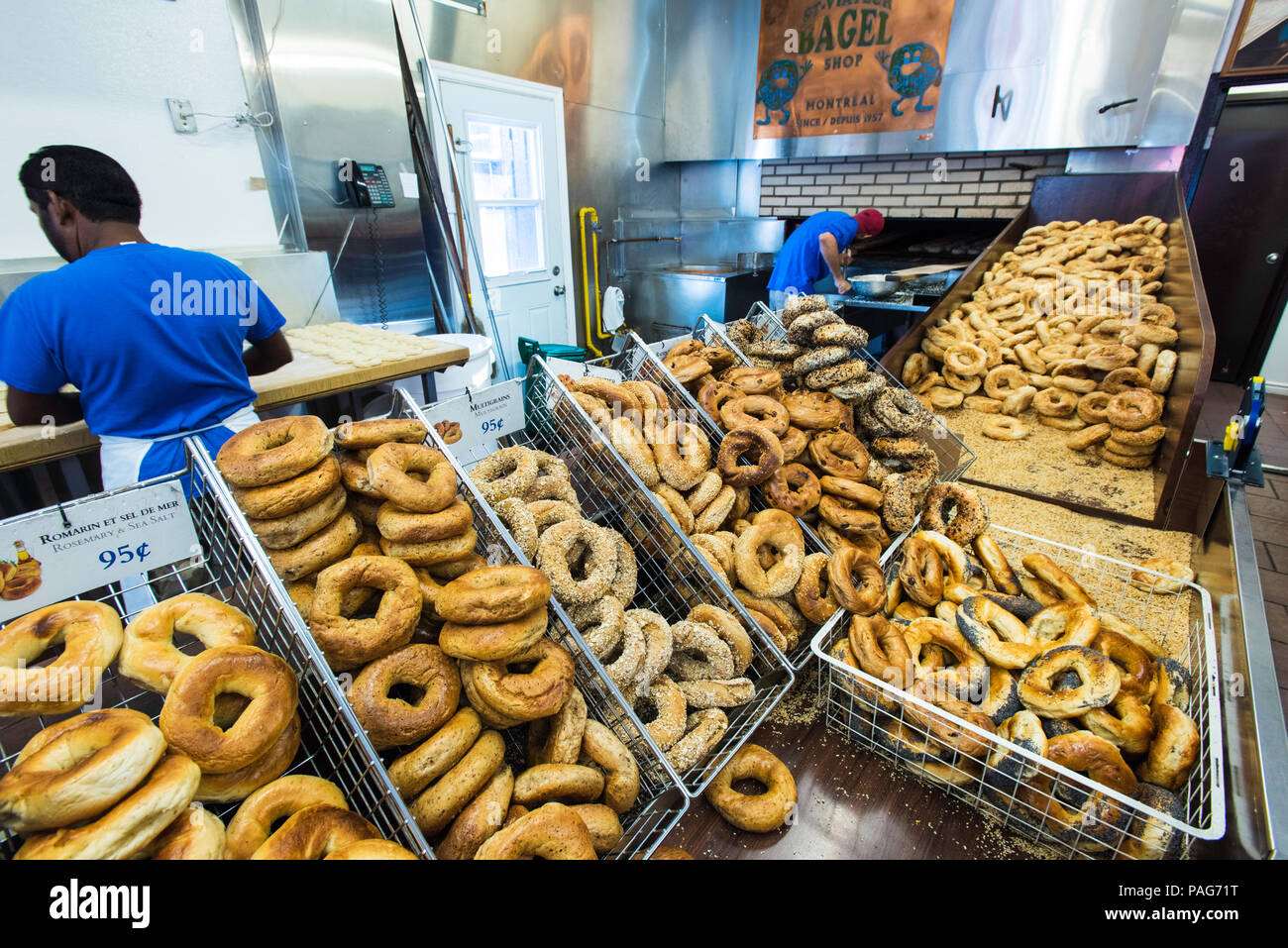 Bagel being prepared and baked at St-Viateur Bagel shop in Montreal Stock Photo