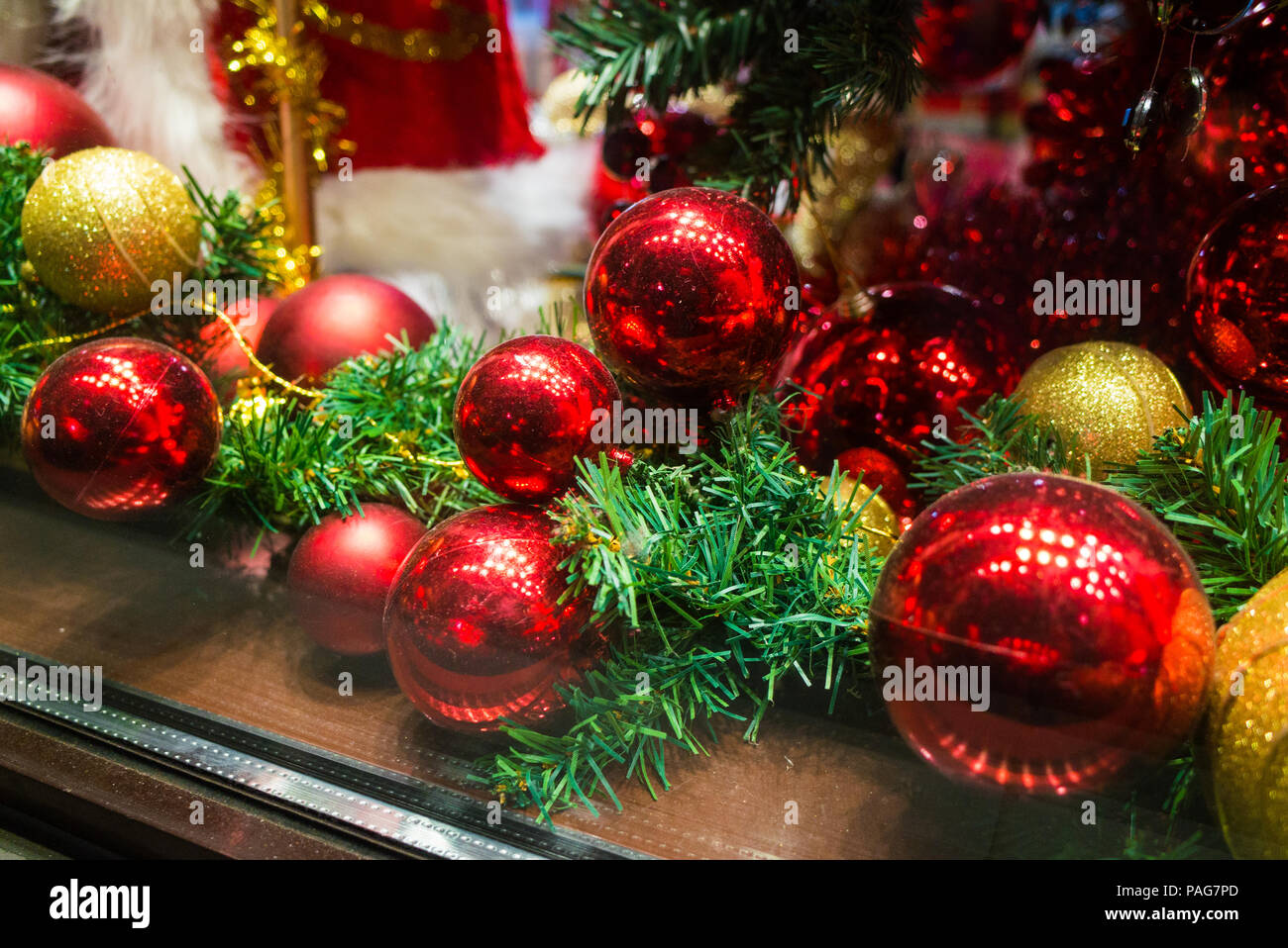 Christmas tree toys in the shop window Stock Photo Alamy