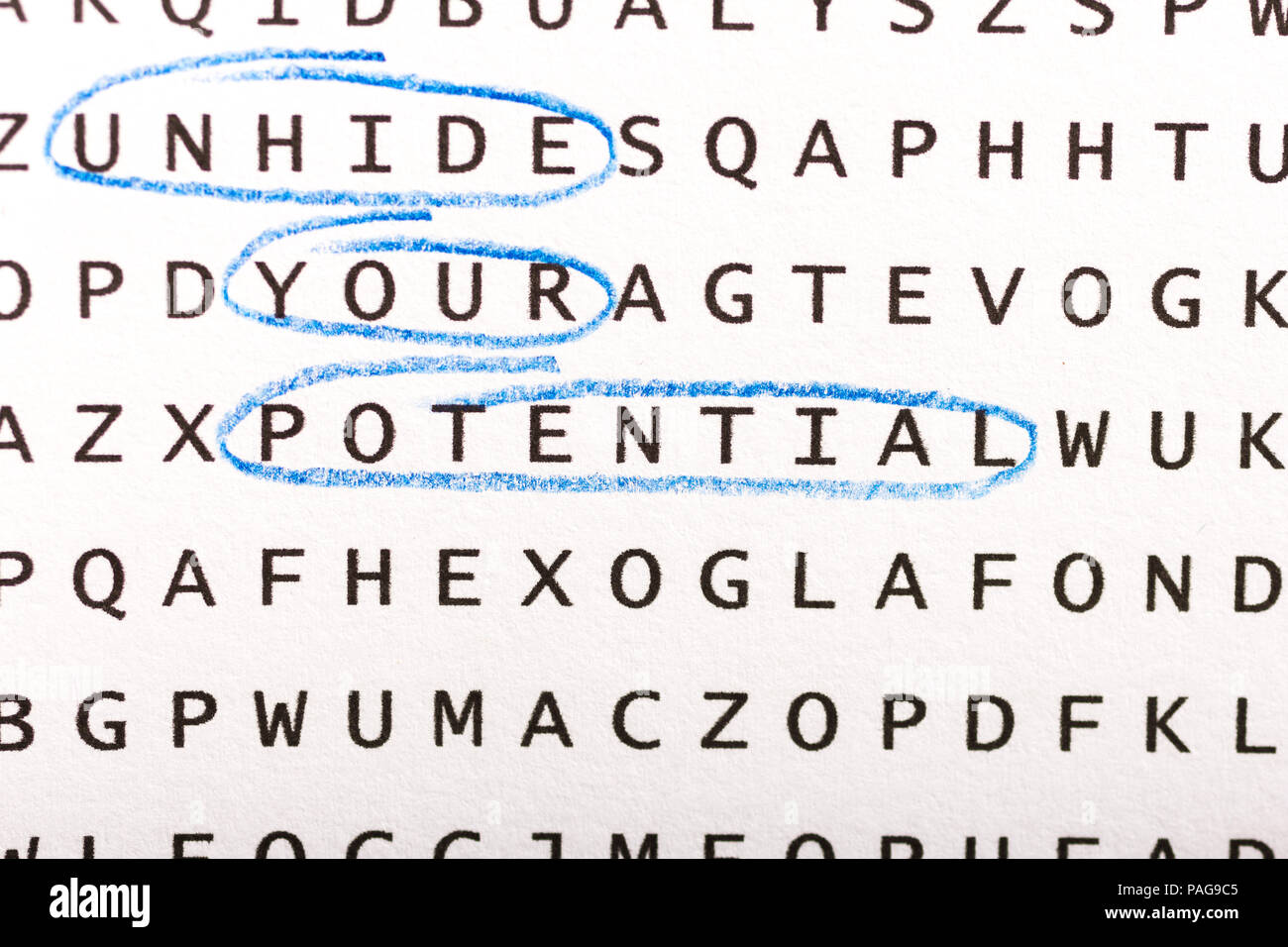 Word search, puzzle. Close up of letters on canvas. Concept about finding, unhide your potential, persistence, growth. Stock Photo