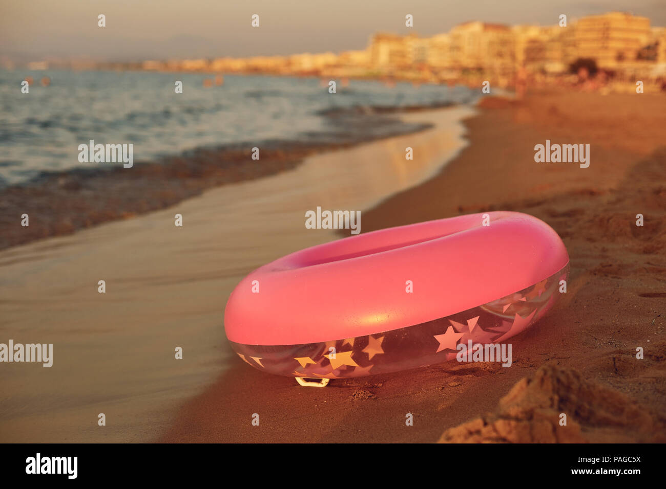 An inflatable circle for swimming in the sea. Stock Photo