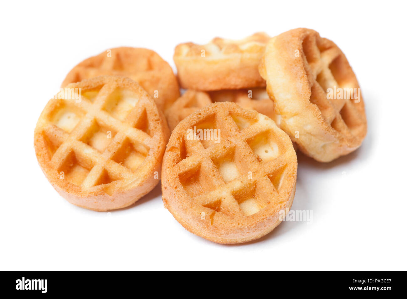 Group of tasty round mini waffles isolated on white background Stock