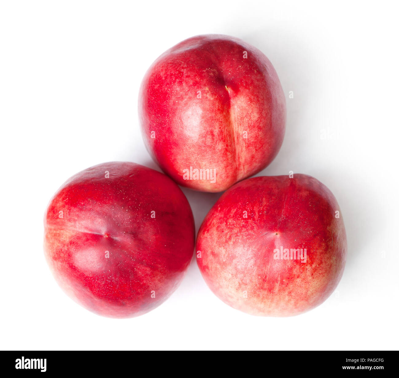 Few tasty nectarines isolated on white background Stock Photo