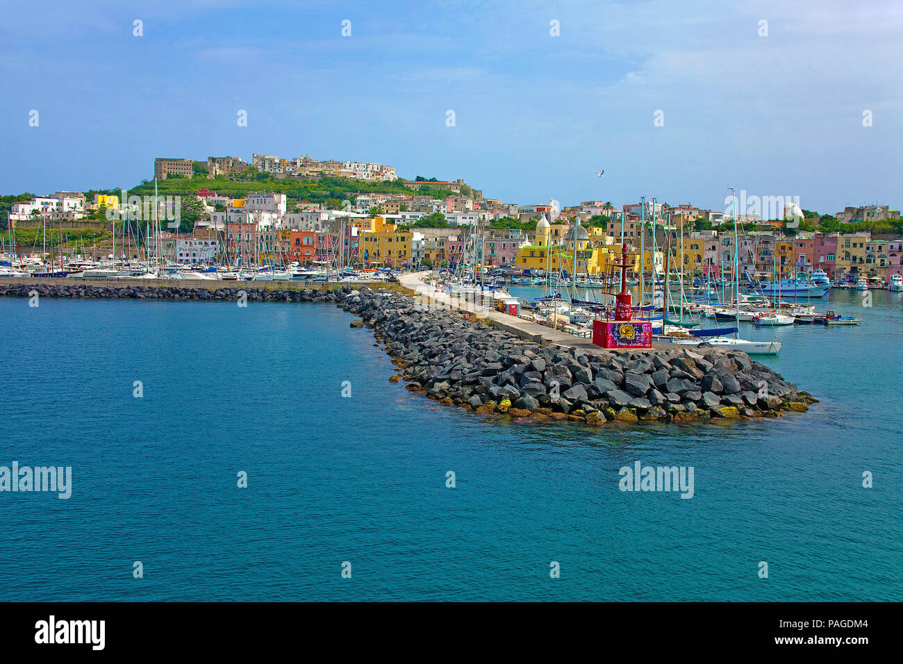 Boats at Marina Grande, above the fortress Terra Murata, Procida island, Gulf of Naples, Italy Stock Photo