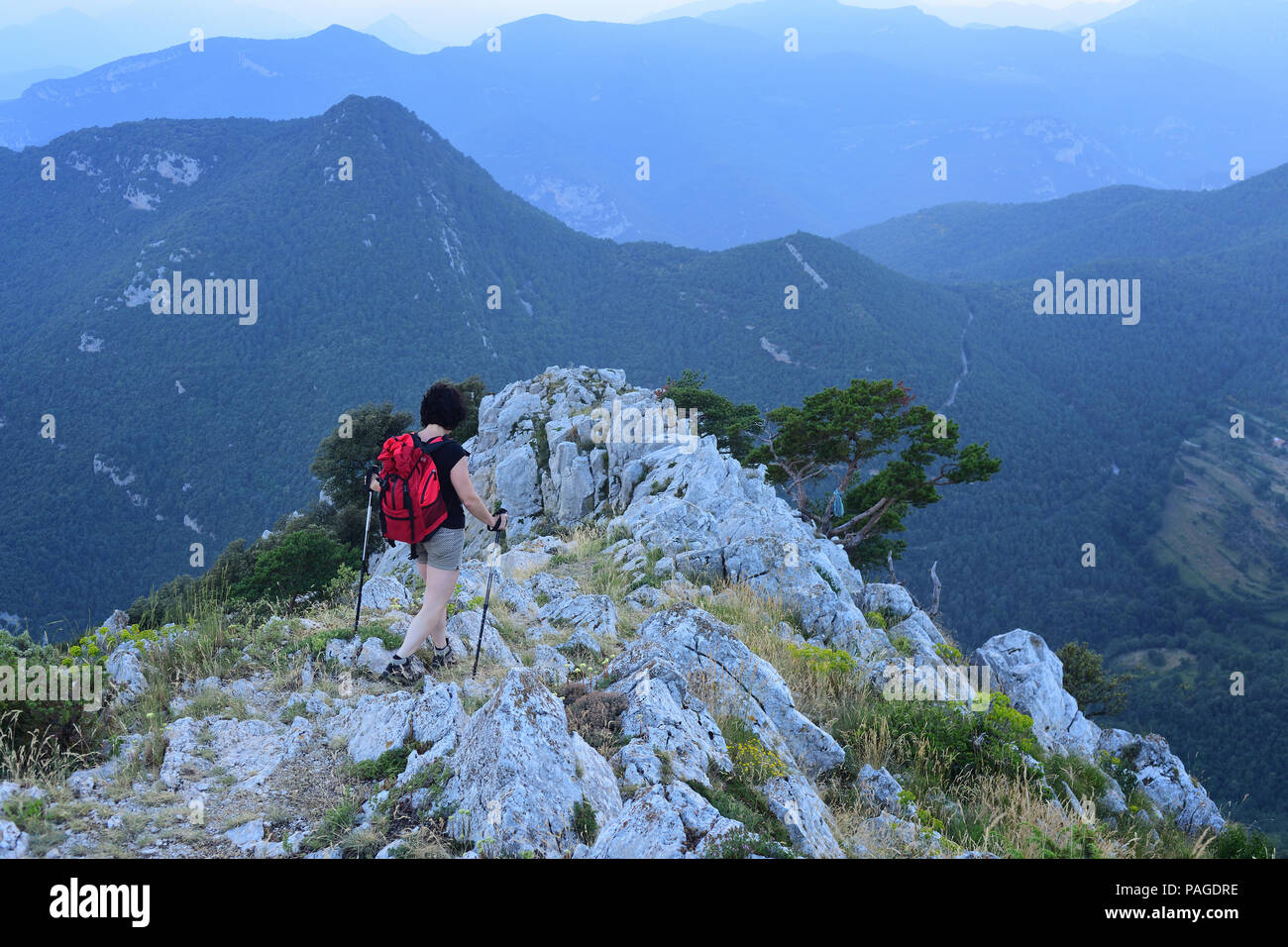 hiking woman walking on the mountain Stock Photo - Alamy