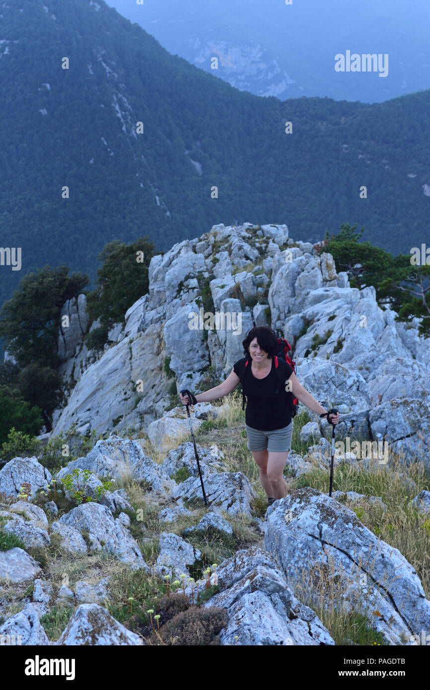 hiking woman walking on the mountain Stock Photo - Alamy
