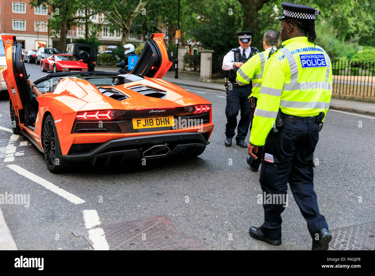 Sloane Street, London, UK, 20th July 2018. Supercars, high-performance and  classic cars, as well as some characterful adaptions, line up and drive  along Sloane Street for Supercar Sunday, which sees around 400